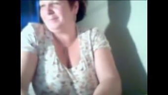 A Mature Woman Shows Her Tits On Cam 2.
