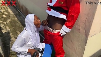 Santa And Hijab-Clad Babe Engage In Festive, Intimate Encounter. Subscribe For More.