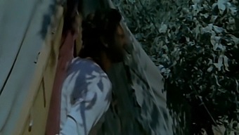 A Married Woman Engages In A Steamy Encounter With A Black Man, All While Her Unsuspecting Husband Watches From The Bushes